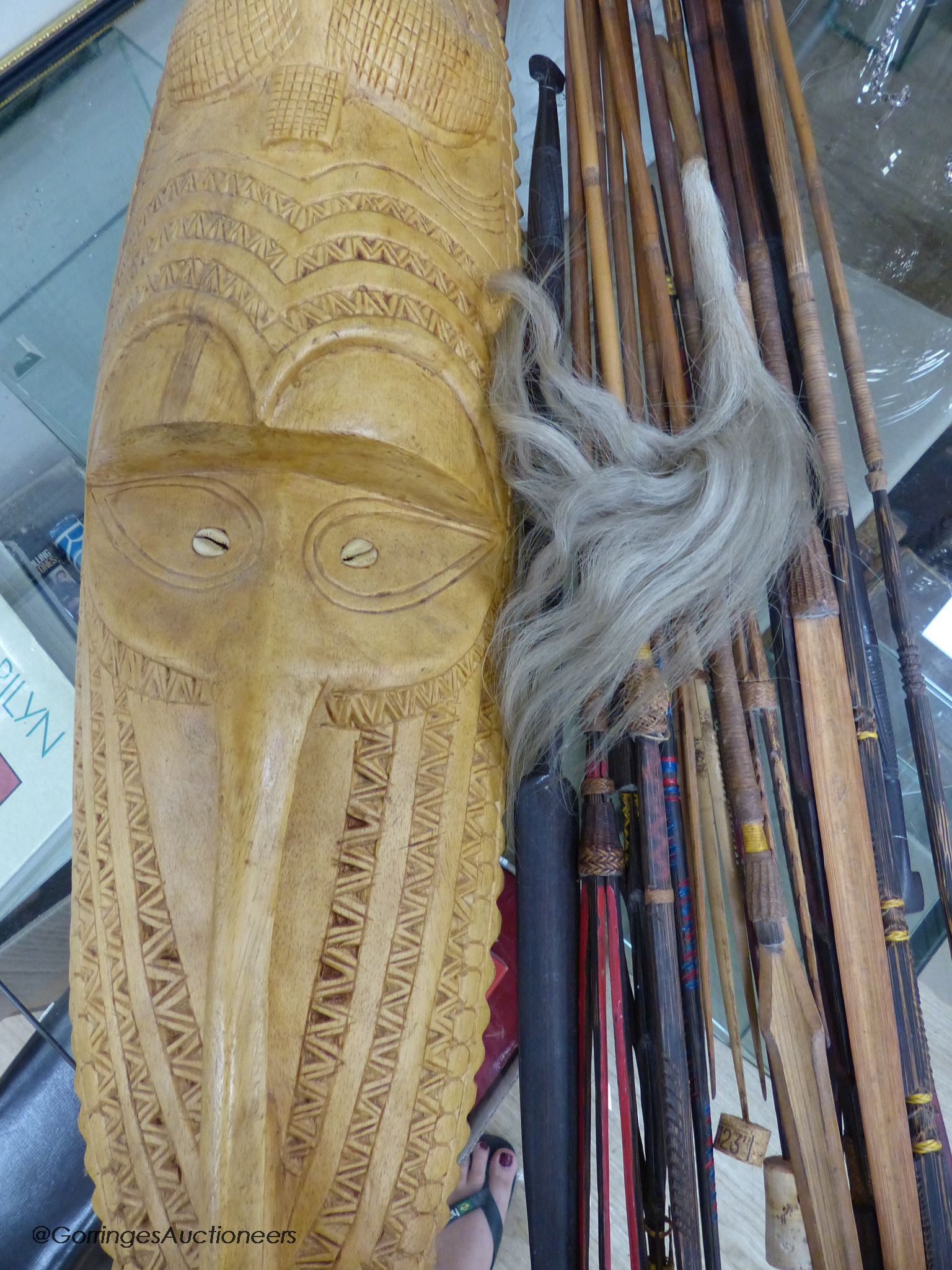 A collection of Tribal style spears etc and a mask